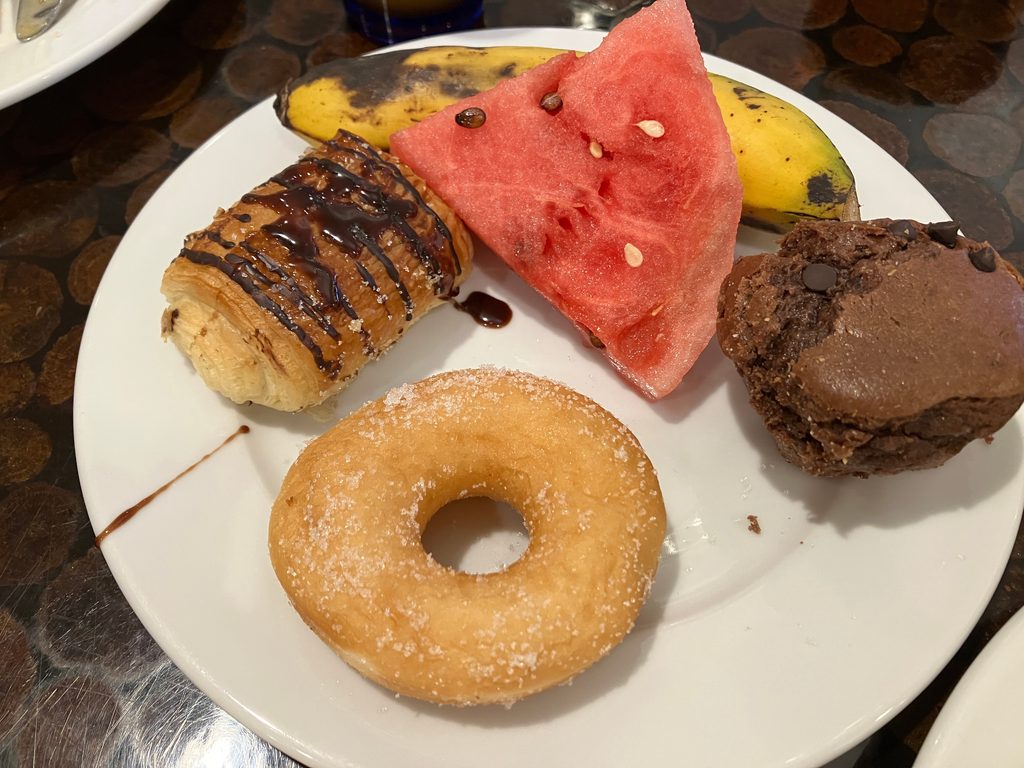 Donuts and sweet bread at the breakfast buffet