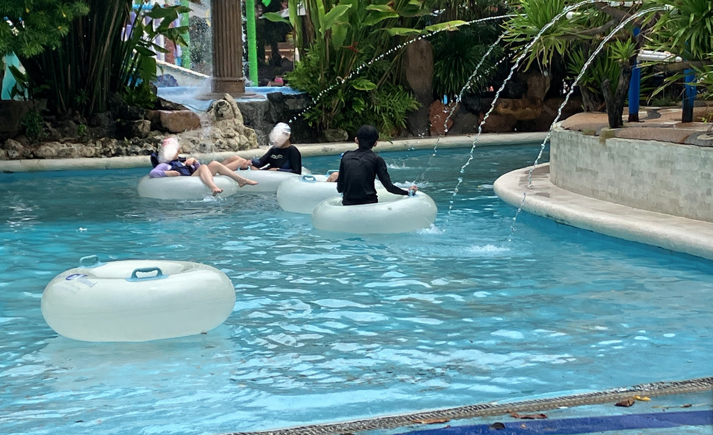 Floating in the hotel pool